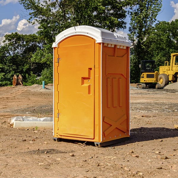 how often are the portable restrooms cleaned and serviced during a rental period in Waupaca County